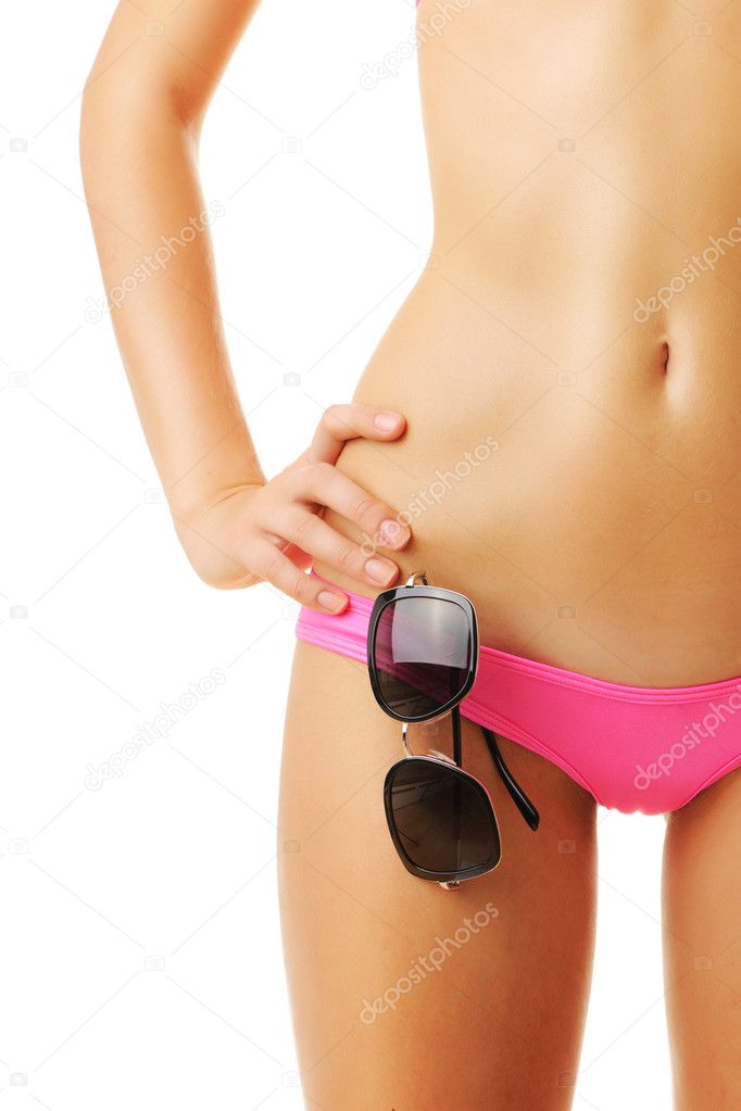 Sexy tan woman in bikini close-up