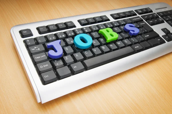 Conceito de emprego com palavras no teclado — Fotografia de Stock