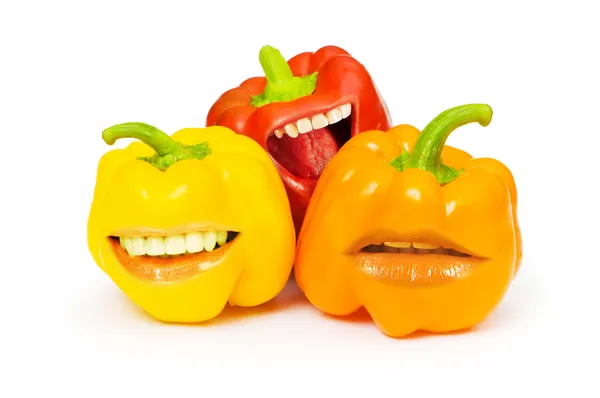 Three bell peppers with funny mouth on white — Stock Photo, Image