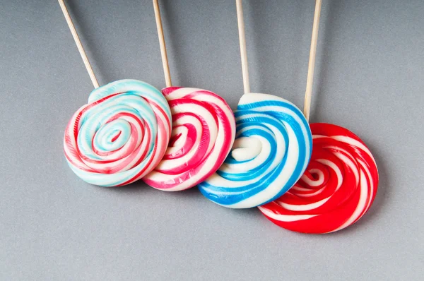 stock image Colorful lollipop against the background