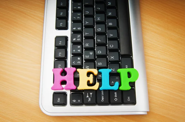 Kavramı klavye üzerindeki harfler ile yardım — Stok fotoğraf