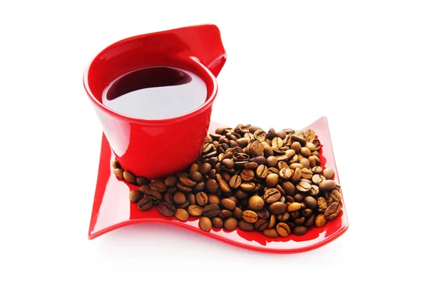 Tasse Kaffee mit vielen Bohnen — Stockfoto