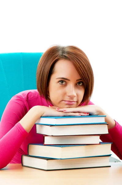 Jonge vrouwelijke student met veel studie boeken — Stockfoto