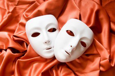 Theatre concept with the white plastic masks clipart