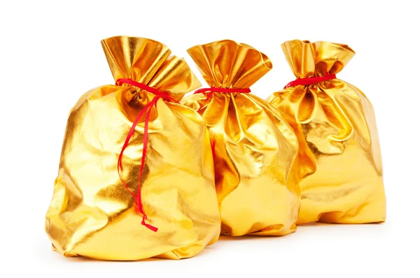 Sacos dourados cheios de algo bom — Fotografia de Stock