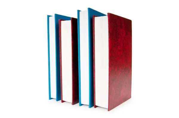 Stack av böcker isolerade på den vita bakgrunden — Stockfoto