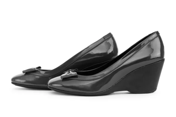 Zwarte schoenen geïsoleerd op de witte achtergrond — Stockfoto