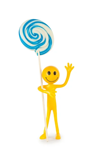 Smiley houden kleurrijke lollipop geïsoleerd op wit — Stockfoto