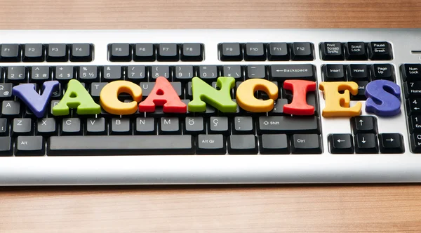 Employment concept with words on keyboard — Stock Photo, Image