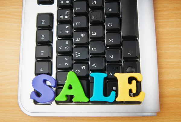 SALE word on the keyboard — Stock Photo, Image
