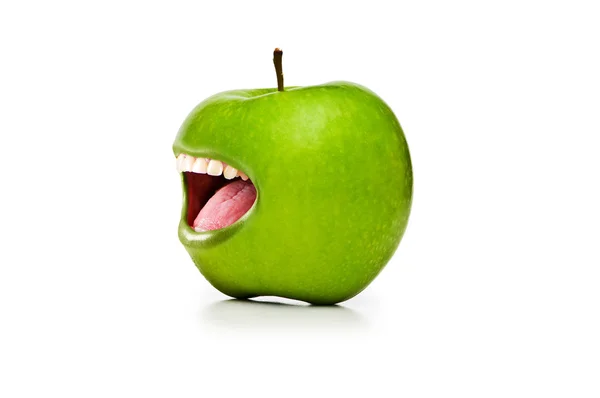 Green apple with open mouth on white — Stock Photo, Image