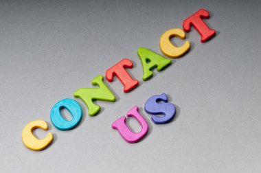 Contact us concept with letters on background clipart