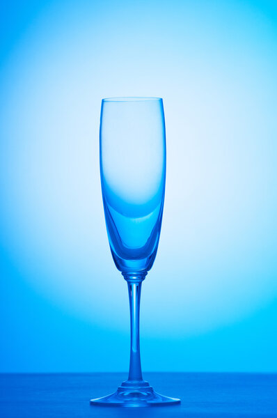 Wine glasses against gradient background