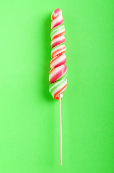 Färgglada lollipop mot bakgrund — Stockfoto