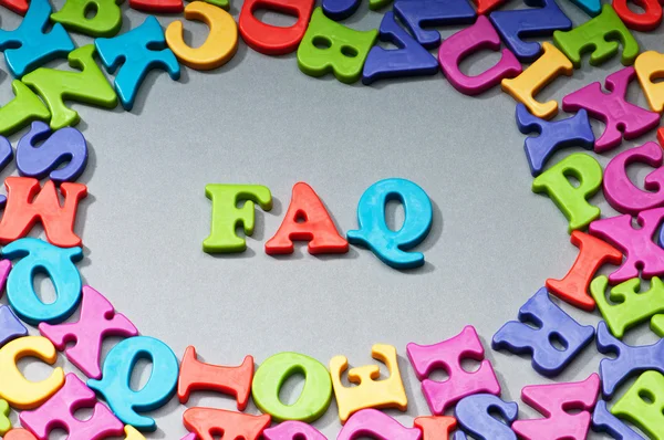FAQ word on the background — Stock Photo, Image