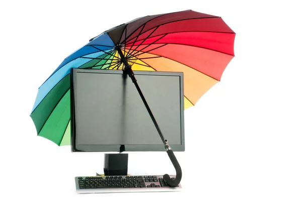 stock image Computer under protection of umbrella