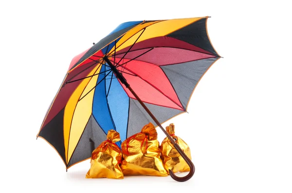 stock image Golden sacks under protection of umbrella