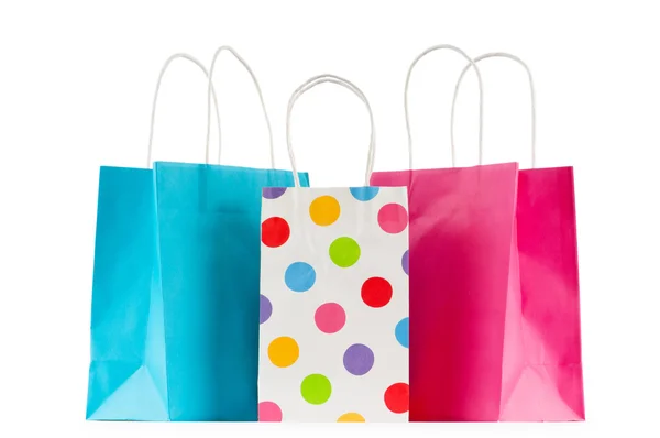 Bolsas de compras de papel de colores aisladas en blanco —  Fotos de Stock