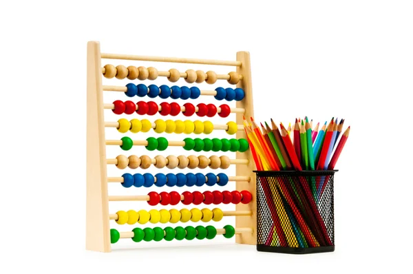 Abacus en potloden geïsoleerd op wit — Stockfoto