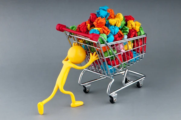 Conceito de reciclagem com papel colorido e carrinho de compras — Fotografia de Stock