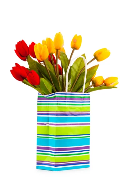 Tulips in the bag isolated on white — Stock Photo, Image