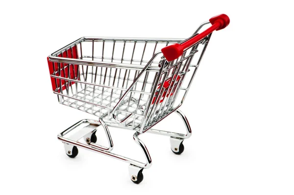 Shopping cart against the white background Royalty Free Stock Photos