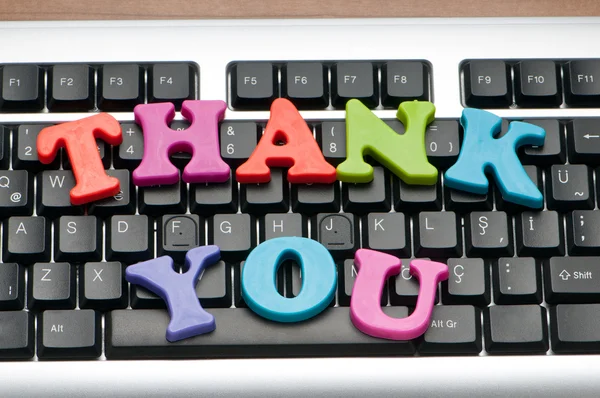 Mensaje de agradecimiento en el teclado — Foto de Stock