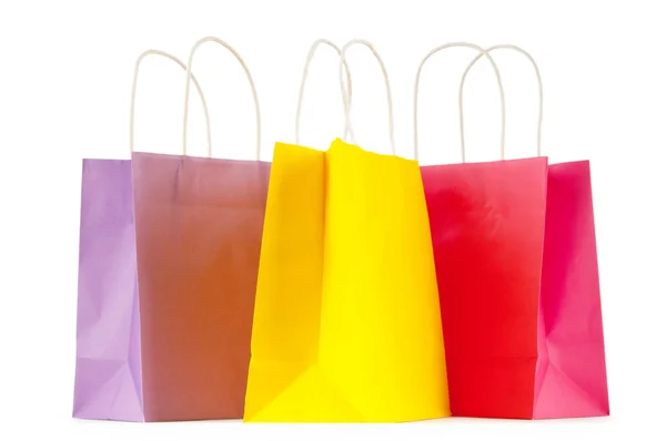 Colourful paper shopping bags isolated on white Royalty Free Stock Photos