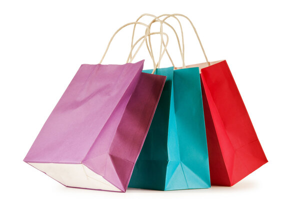 Colourful paper shopping bags isolated on white