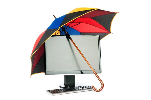stock image Computer under protection of umbrella