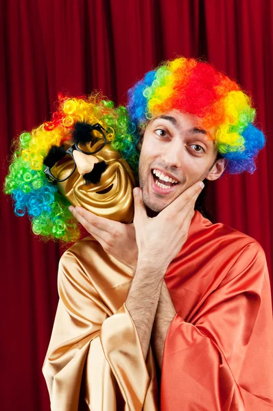 Actor with maks in a funny theater concept — Stock Photo, Image