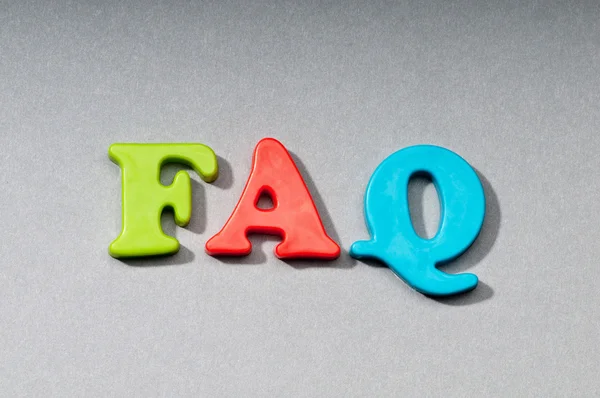FAQ word on the background — Stock Photo, Image