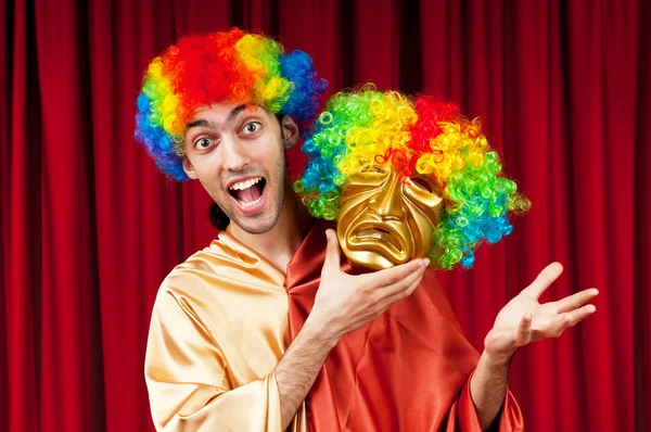 Actor with maks in a funny theater concept — Stock Photo, Image