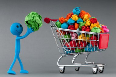 Recylcing concept with color paper and shopping cart clipart