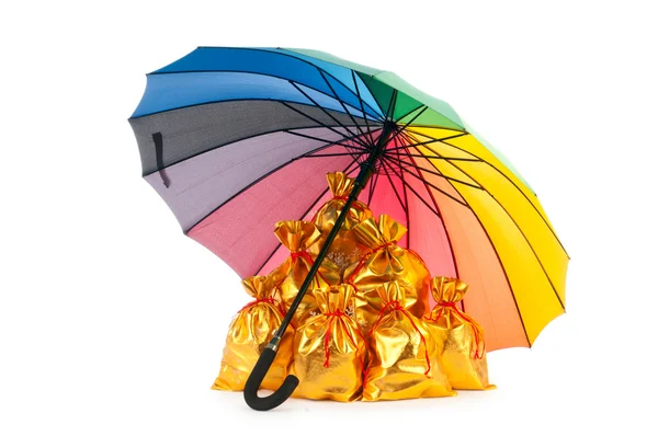stock image Golden sacks under protection of umbrella