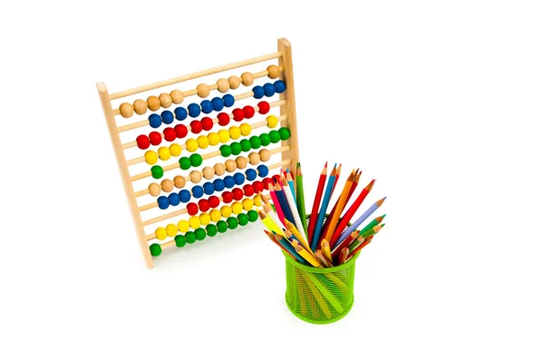 Abacus and pencils isolated on white — Stock Photo, Image