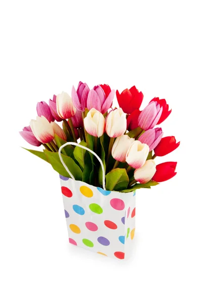 A táska, elszigetelt fehér tulipánok — Stock Fotó