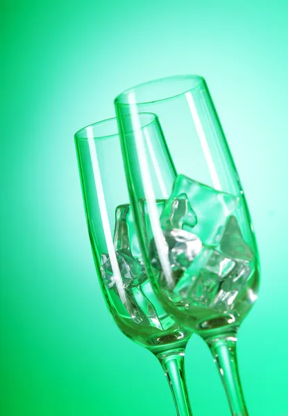 Glasses of water against gradient background — Stock Photo, Image