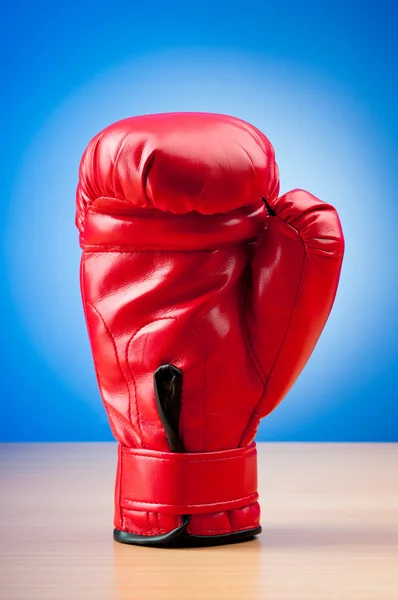 Red boxing gloves on the background — Stock Photo, Image