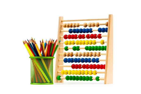 Abacus en potloden geïsoleerd op wit — Stockfoto