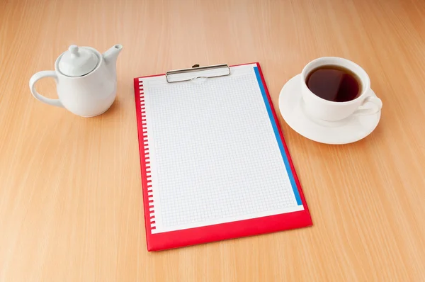 Binder with blank page and tea — Stock Photo, Image