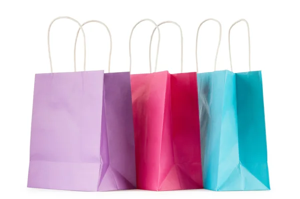Colourful paper shopping bags isolated on white Stock Picture