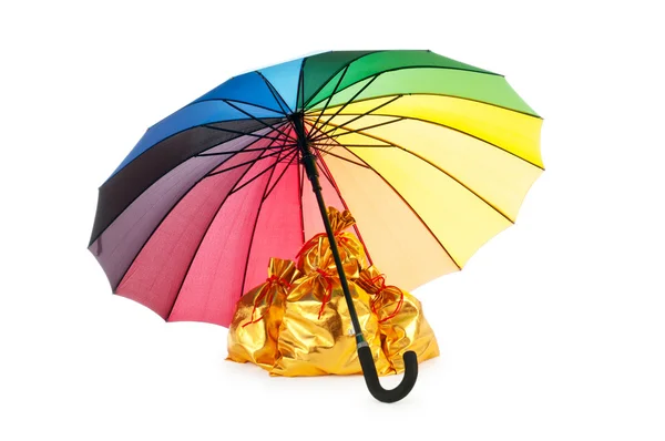 Sacchi d'oro sotto protezione di ombrello — Foto Stock
