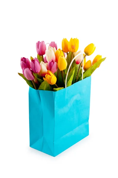 Tulips in the bag isolated on white — Stock Photo, Image