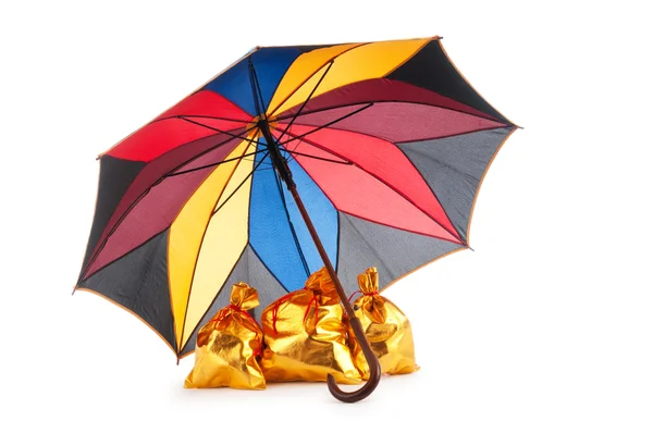 stock image Golden sacks under protection of umbrella