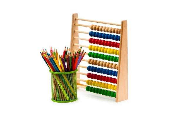 Abacus y lápices aislados en blanco — Foto de Stock