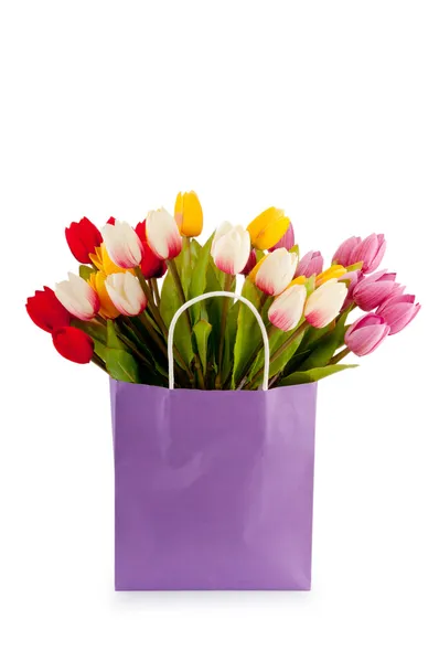 Tulipanes en la bolsa aislados en blanco —  Fotos de Stock