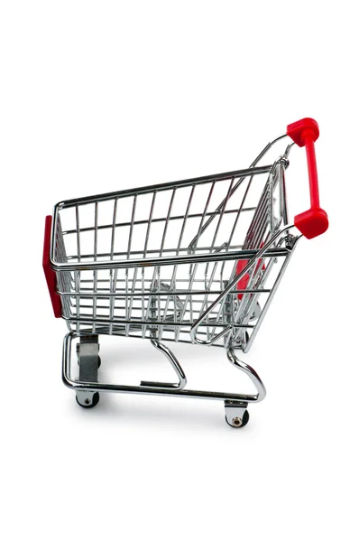Shopping cart against the white background — Stock Photo, Image