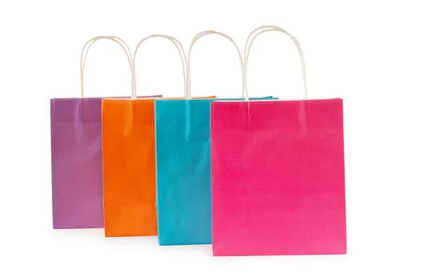 Цветные пакеты для покупок, изолированные на белом — стоковое фото