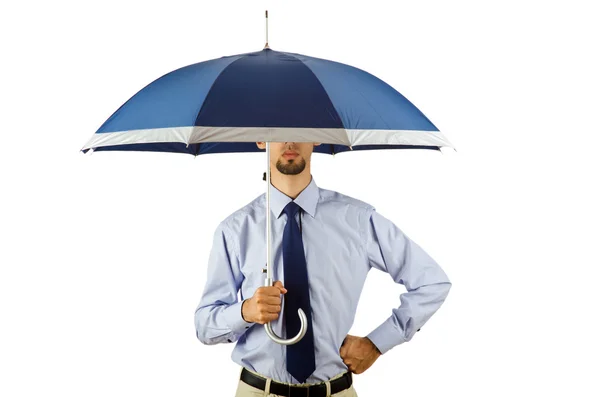 Empresario sosteniendo paraguas en la oficina —  Fotos de Stock